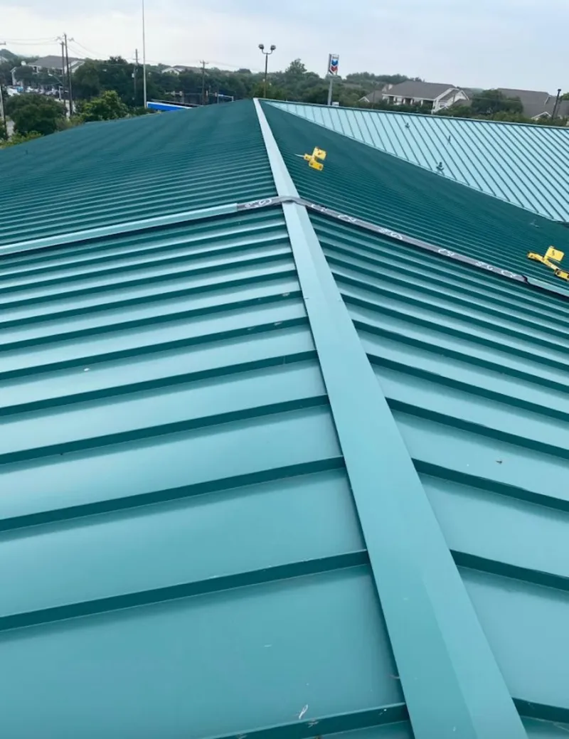 Green commercial metal roof ridge and valley for Metal Roof Repair in Jan Phyl Village