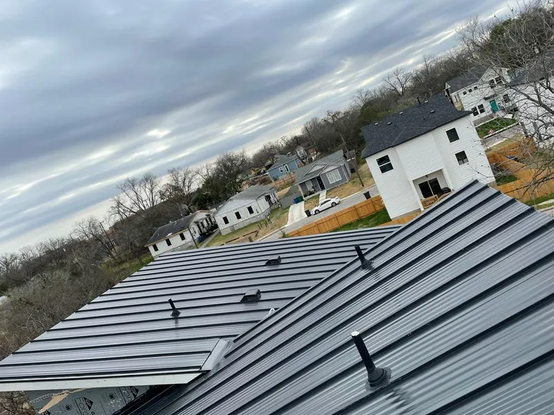 Standing seam metal roof panels with vents for Skylight Repair in Jan Phyl Village